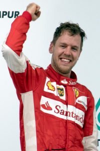 Sebastian_Vettel_2015_Malaysia_podium_2